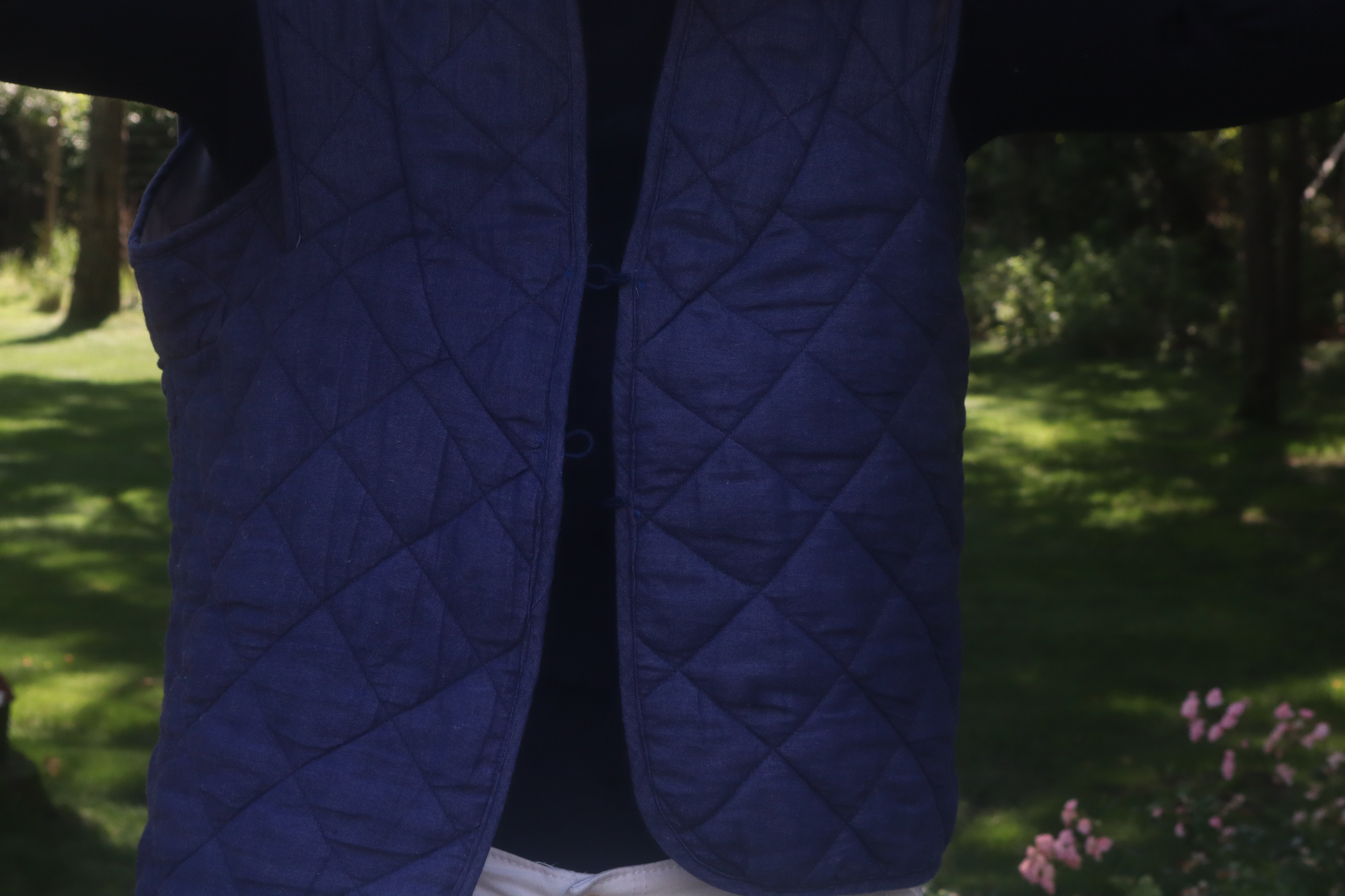 Navy Vest with Closure. A lightweight Navy Blue Vest pictured in Lawn made for everday.