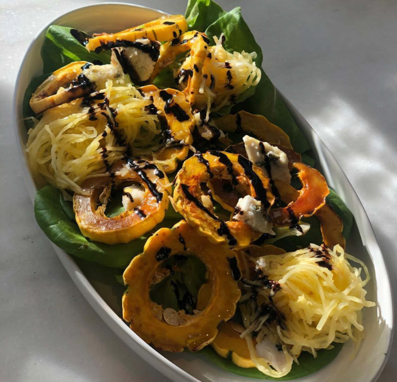 Roasted Squash Salad with Blue Cheese, Spaghetti Squash, and Balsamic Drizzle