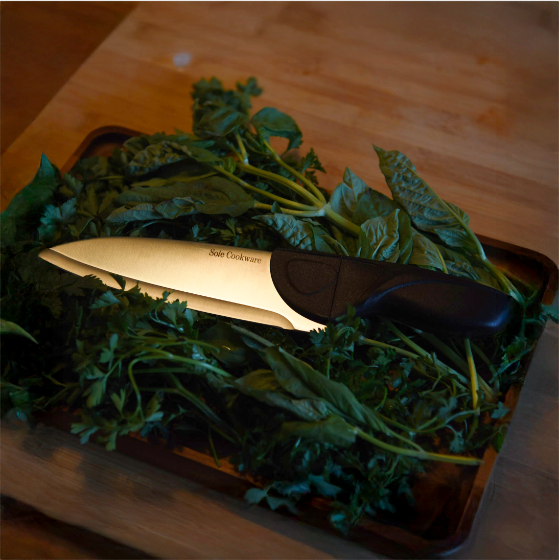 Knife on a cutting board with green leafy vegetables